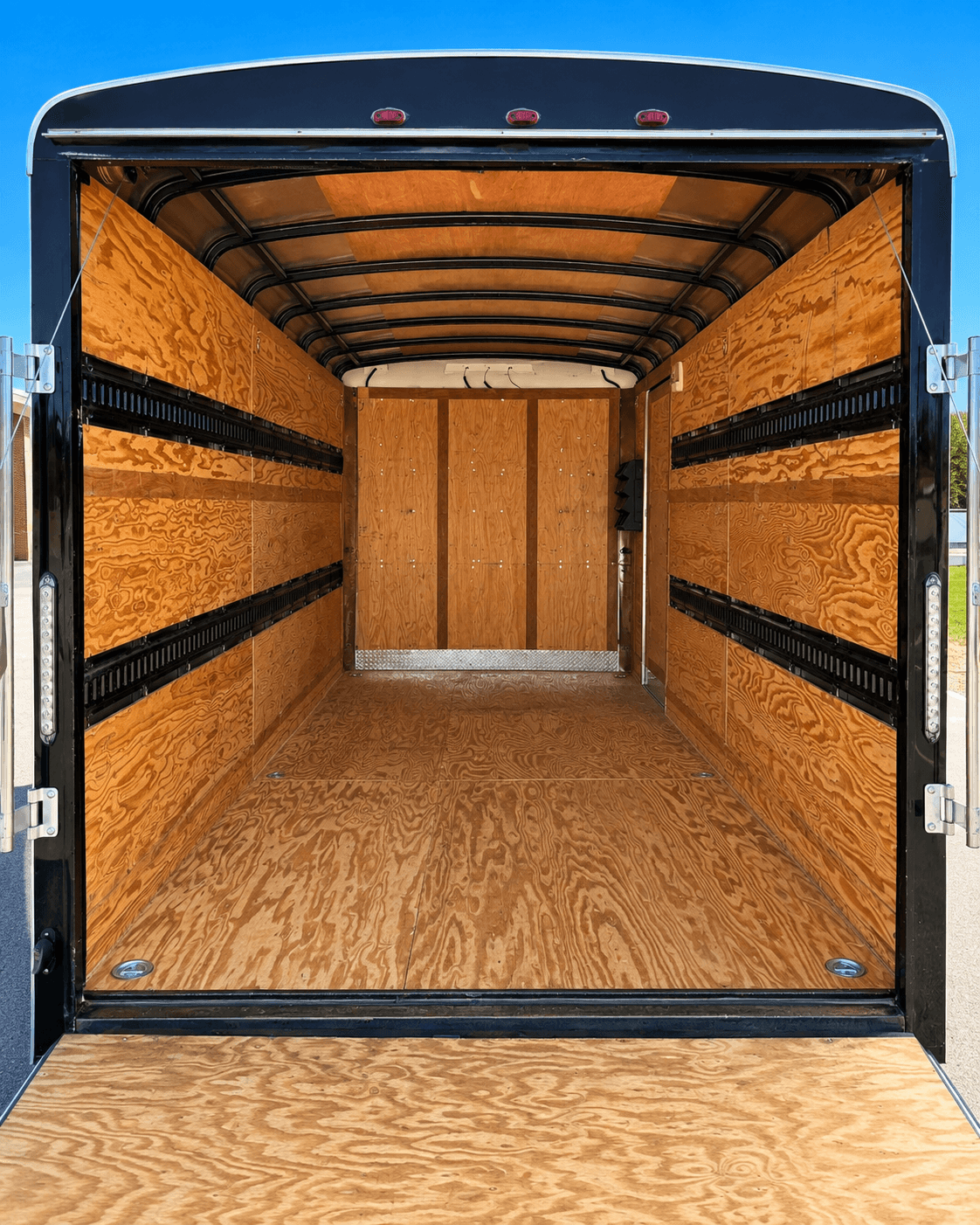 An empty Get It Out Cleanouts trailer, ready to be dropped off and filled